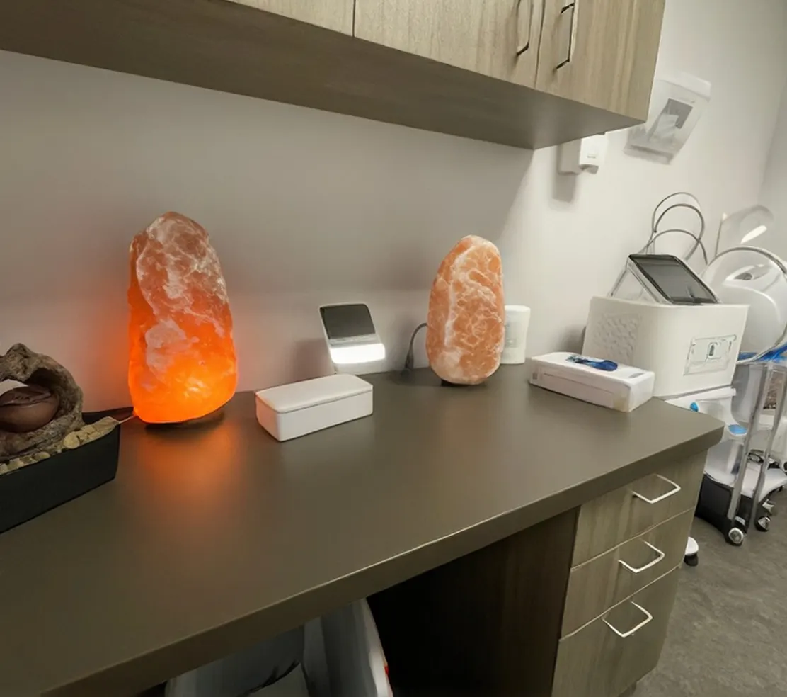 Treatment room at Optimal Health Wellness Clinic with testing equipment on the counter